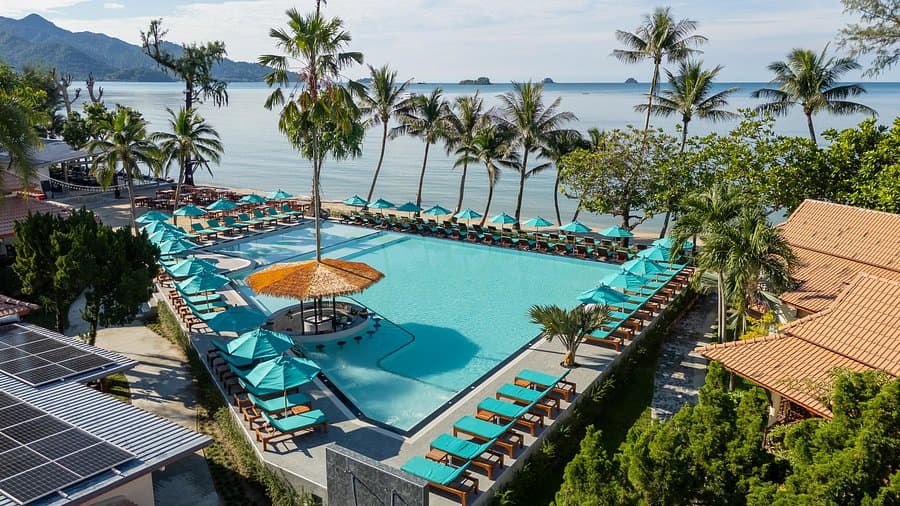 Luxury resort pool by the beach
